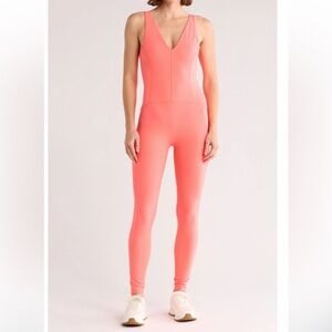 NWT! Free People FP Movement Never Better Strappy Back Jumpsuit NEON CORAL Med